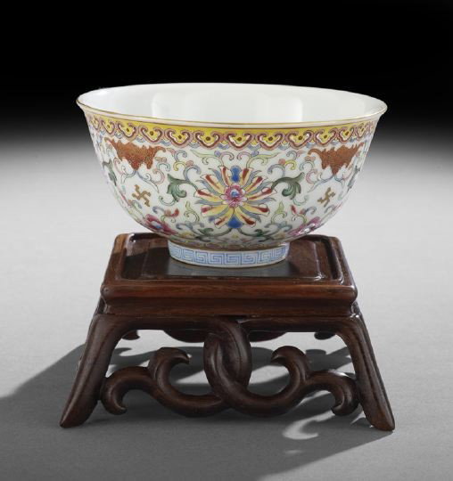 Good Chinese Famille Rose Rice Bowl: Good Chinese Famille Rose Rice Bowl, Republic Period (1911-1949), enameled on the exterior with flowering stylized lotus flowers with scrolling foliage, bats and Buddhistic swastikas and bordered at t