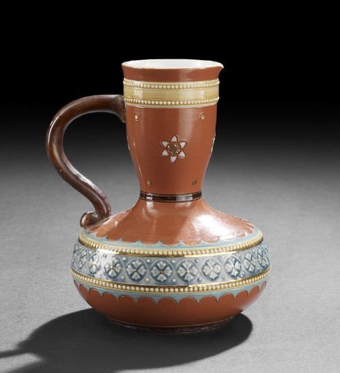 Mettlach Stoneware Jug: Mettlach Stoneware Jug, last quarter 19th century, molded in renaissance motifs and glazed in blue, terracotta and brown, marked with impressed "Mettlach" stamp, h. 5-1/2".