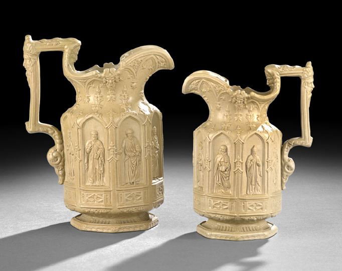 Two Graduated Tan Salt-Glazed Apostle Ware Jugs: Two Graduated Tan Salt-Glazed Apostle Ware Jugs, second quarter 19th century, the larger jug unsigned with pattern numbers, 59 over 12, the smaller with a pad mark for "Charles Meigh", each is molded 