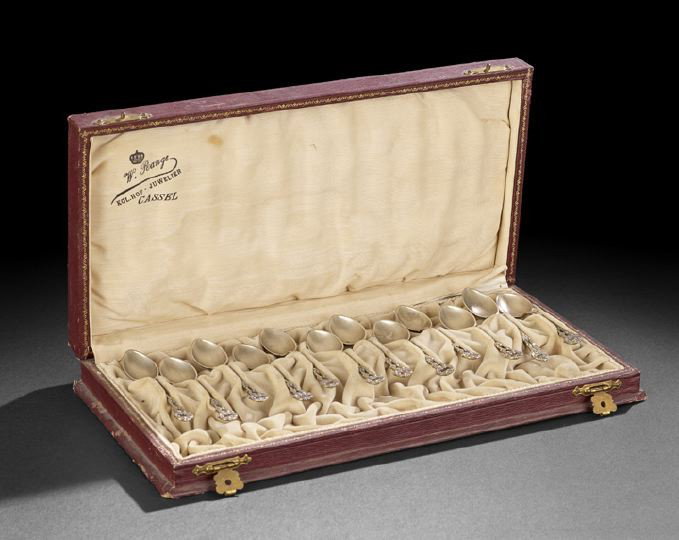 Twelve German .800 Silver Gilt Demitasse Spoons: Cased Set of Twelve German .800 Silver Gilt Demitasse Spoons, ca. 1900, by Franz Bahner, Dusseldorf, retailed by Wilhelm Range, Kassel, each with a spiral-twist handle and openwork addorsed rococo scr