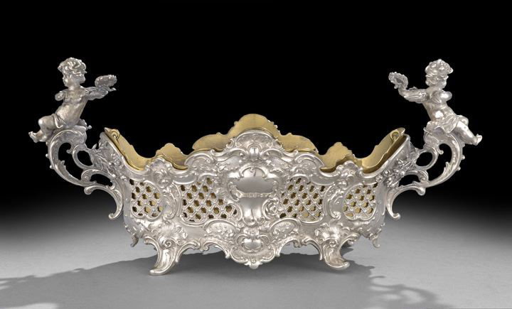 German .800 Silver Jardiniere: German .800 Silver Jardiniere, first quarter 20th century, M. H. Wilkens, Bremen, in the Rococo taste, of shaped navette form, decorated with elaborate embossed rococo scrolls and reticulated latticew