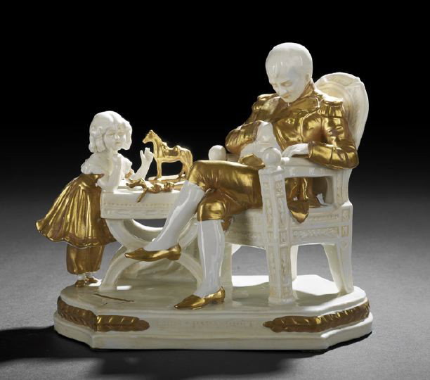 Continental Belle Epoque Porcelain Table Figure: Continental Belle Epoque Porcelain Table Figure, c. 1900, executed in gilt and white, depicting a Napoleon asleep in a chair while the King of Rome plays nearby on a curule footstool, marked, "Chois P