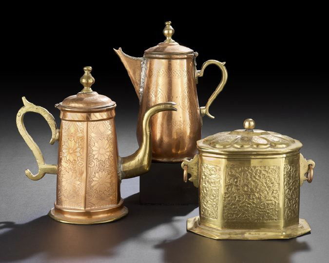 Three Middle Eastern Copper and Brass Objects: Three Middle Eastern Copper and Brass Objects, all chased in regional patterns, the octagonal brass tobacco box has a lobed lid and brass ring handles, the coffee pot and hot milk jug each have brass