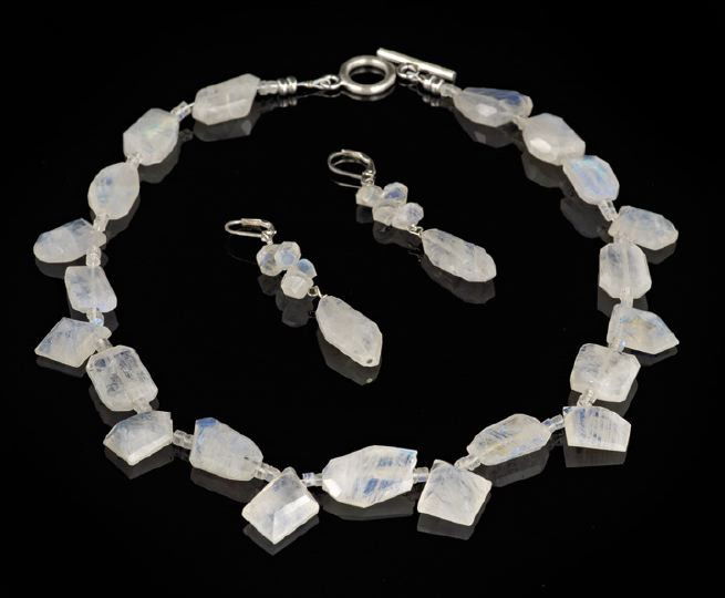 Single Strand Moonstone Necklace and Earring Set: Subtle Single Strand Moonstone Necklace and Earring Set, each piece faceted and polished unusual geometric shapes with subtle iridescence giving the necklace an ever-changing look depending on light a