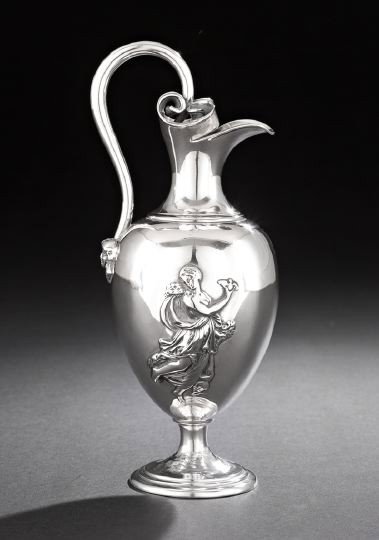 Tiffany & Co. Sterling Silver Neo-Grec Ewer: 19th Century Tiffany & Co. Sterling Silver Neo-Grec Ewer, third quarter 19th century, by John C. Moore (1802-1874), New York City, New York, the ovoid body decorated with a pair of embossed figures of