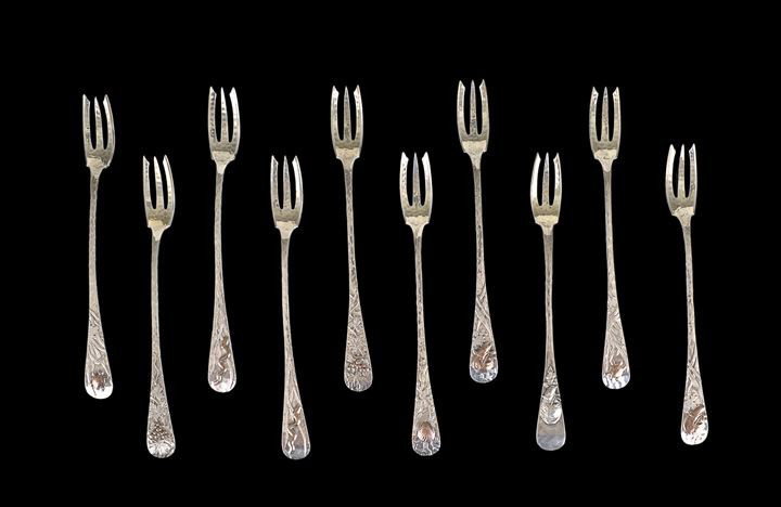 Ten Whiting Mixed Metal Aesthetic Cocktail Forks: Good Set of Ten Whiting Sterling Silver Mixed Metal Aesthetic Cocktail Forks, first quarter 20th century, Providence, Rhode Island, retailed by Theodore B. Starr, New York City, New York, in Whiting's