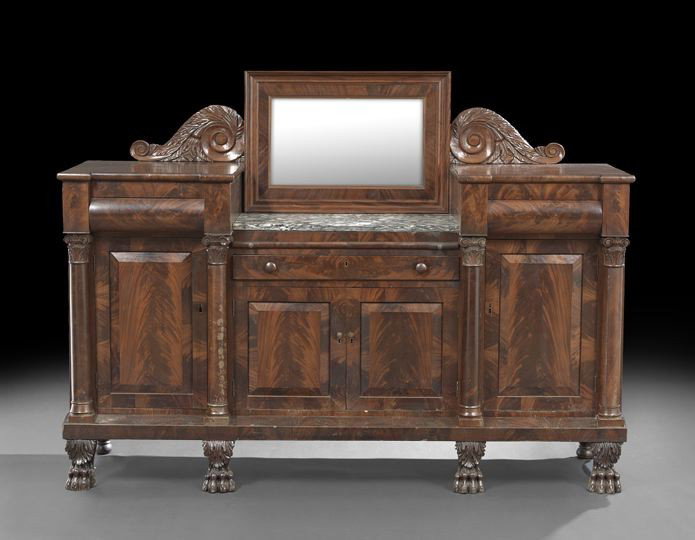 American Classical Mahogany Sideboard: American Classical Mahogany Sideboard, second quarter 19th century, the deep center with a King of Prussia marble top backed by a rectilinear mirror plate, flanked by acanthus-carved scroll brackets, 