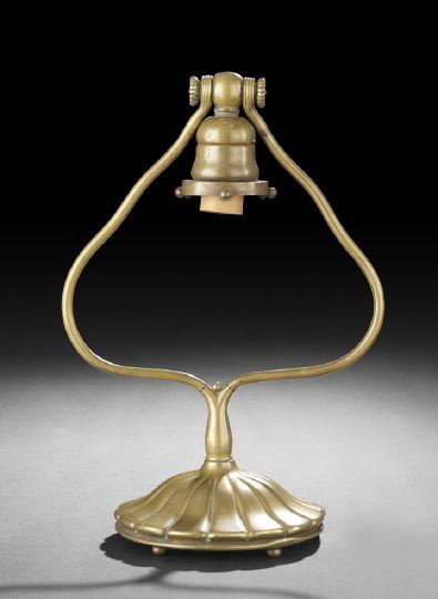 Tiffany Studios Bronze Harp Desk Lamp Base: Tiffany Studios Bronze Harp Desk Lamp Base, fourth quarter 19th century, with a swivel bronze hanging loop, stamped underneath, "Tiffany Studios/New York/21217" and below it the mark for Tiffany Glass