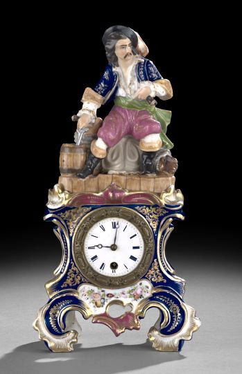 Paris Porcelain Rococo Revival Mantel Clock: Paris Porcelain Two-Part Rococo Revival Mantel Clock, second quarter 19th century, in the manner of Jacob Petit, depicting a pirate holding a pistol, sitting next to a keg on a plank base, atop a typi