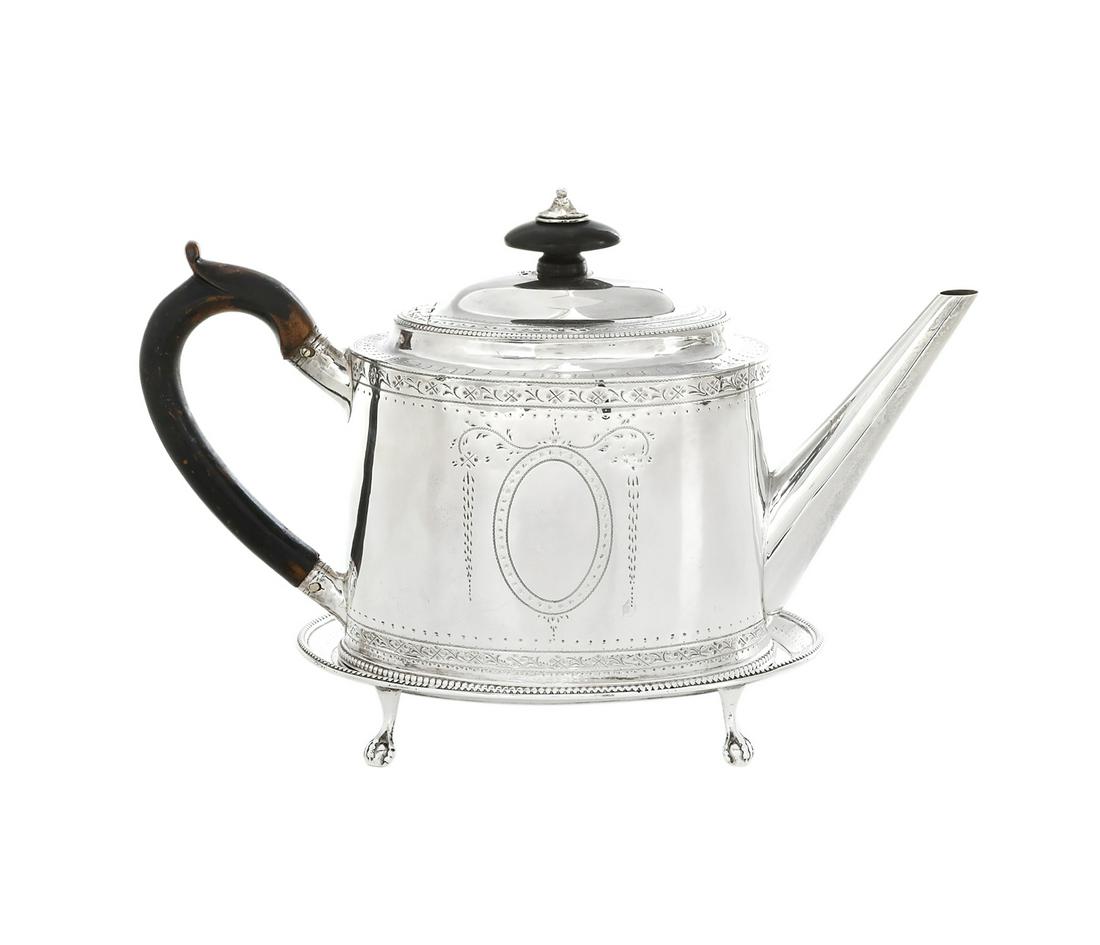 Hester Bateman Sterling Silver Teapot and Stand: Hester Bateman Sterling Silver Teapot and Stand hallmarked London, 1786-1787, Bateman's mark overstruck by that of George Gray, the teapot of slightly tapering oval section, with cavetto collar, hinge