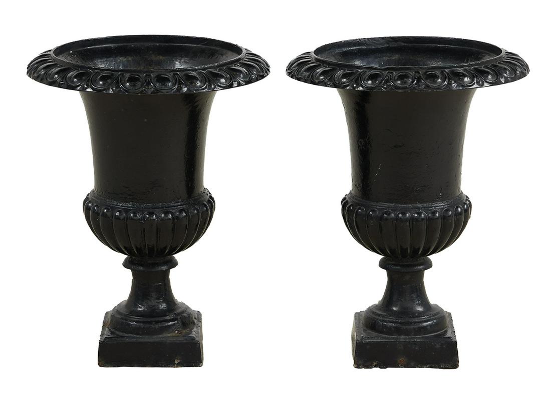 Pair of Cast Iron Campana-Form Garden Urns: Pair of Cast Iron Campana-Form Garden Urns 20th century, in the neoclassical taste, with egg-and-dart rims and reeded lower bodies on square plinth bases. h. 24", dia. 18-1/4"