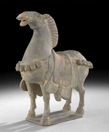 Chinese Gray Pottery Figure of a Horse: Chinese Gray Pottery Figure of a Horse, Tang-Style, with elaborate mane, saddle blanket and a bridle of bells, raised on a rectangular base, h. 16-1/2".