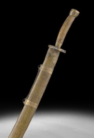 Chinese Shagreen Sword: Chinese Shagreen Sword, the hilt and scabbard covered in shagreen, mounts on each decorated with engraved Chinese scrollwork, l. 38".