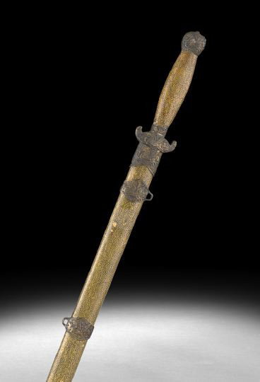 Chinese Shagreen Sword: Chinese Shagreen Sword, the shagreen covered hilt and scabbard decorated with relief molded mounts of winged horses, the steel blade engraved with scrollwork, l. 39".