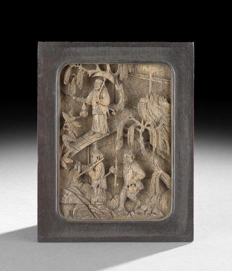 Chinese Carved Panel: Chinese Carved Panel, first quarter 20th century, the three dimensional carving depicting a male figure carrying an umbrella on a footbridge, over a male figure carrying a pipe and a tea kettle, with 