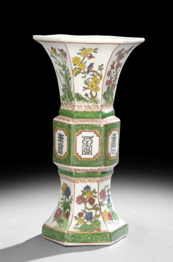 Chinese Polychrome Porcelain Vase: Chinese Polychrome Porcelain Vase, of paneled hexagonal banded beaker form, decorated with panels of floral and foliate patterns, the central band with calligraphic designs, h. 12-1/4".