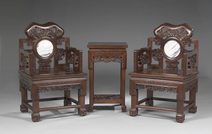 Three-Piece Chinese Rosewood Seating Group: Three-Piece Chinese Rosewood Seating Group, early 20th century, consisting of a pair of armchairs, each with a shaped swept back crest above a back with carved cloud patterns surrounding an inset drea