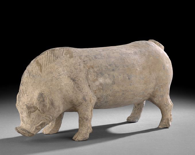 Large Chinese Pottery Figure of a Boar: Large, Impressive Chinese Pottery Figure of a Boar, Han Dynasty (206 BC-220 AD), the large figure standing four square with lowered head, prominent snout, and curled tail, the muscular body resting on