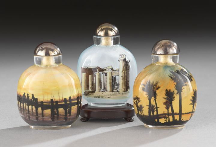 Three Inside Painted Snuff Bottles: Three Inside Painted Snuff Bottles, one with a "Florida Sunset", by Yi Sheng, Hebei, China, January, 2001, h. 3-1/4", another with "Suset and Dock", by Wang Wei, Hebei, China, May, 2001, h. 3-1/4", an