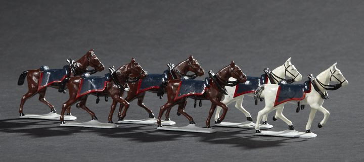 Miscellaneous Calvary/Artillery Lead Toy Soldiers: Miscellaneous Calvary/Artillery Lead Toy Soldiers, consisting of two white horses and four brown horses, all with blue saddlecloths trimmed in scarlet, separate harness collars, 1:32 scale. Provenance