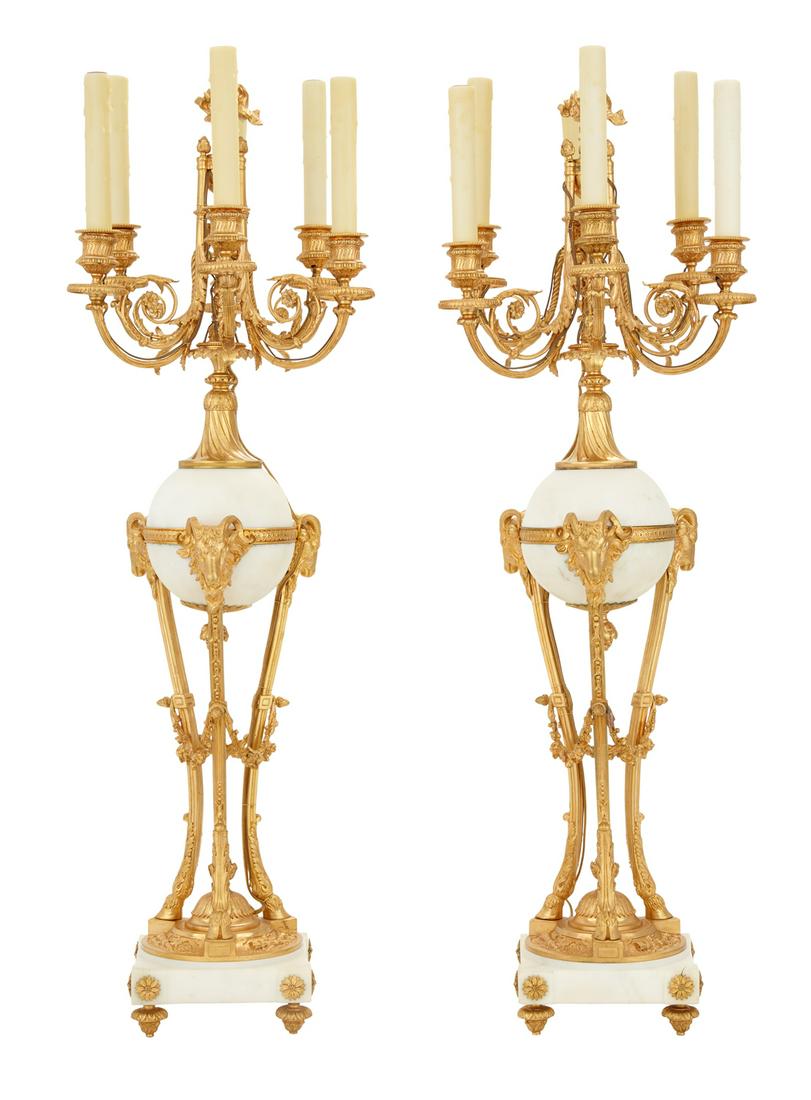 Pair of French Gilt-Bronze and Marble Candelabra: Pair of French Gilt-Bronze and Marble Candelabra fourth quarter 19th century, with rope-twist arms supporting reeded candle sockets on beaded drip pans, around an unusual center finial depicting a smo