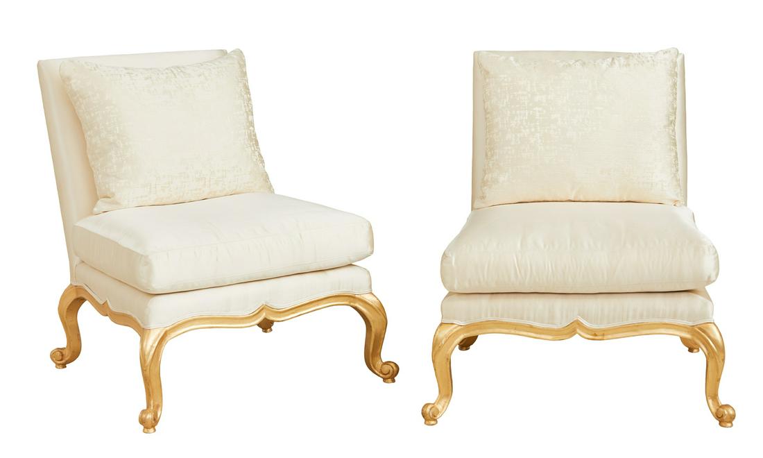 Pair of Louis XV-Style Giltwood Chaises: Pair of Contemporary Louis XV-Style Giltwood Chaises each with a padded, square back above a deep, cushioned seat, raised on gilt cabriole legs ending in scrolled toes. h. 38", w. 33", d. 32" Provenan