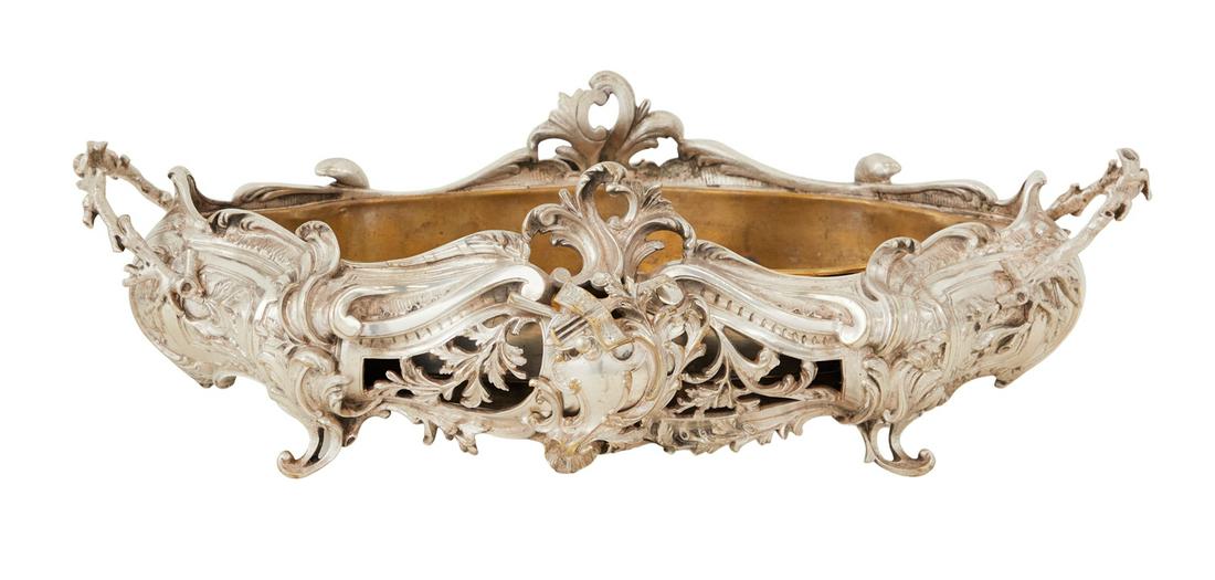 Continental Bronze Argente Jardiniere: Continental Bronze Argente Jardiniere late 19th century, in the rococo taste, of rounded navette form, decorated with robust acanthus scrolls which extend to form the sides, having openwork-mantled ca