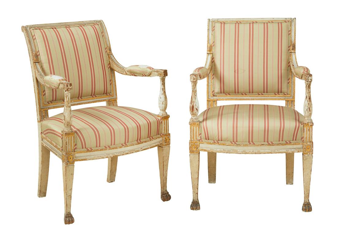 Pair of Directoire Parcel-Gilt Fauteuils: Pair of Directoire Parcel-Gilt and Blanc Peinte Fauteuils late 18th century, each with a backswept crest above a padded back, joined by like arms on bulbous uprights to the padded seat, raised on tape