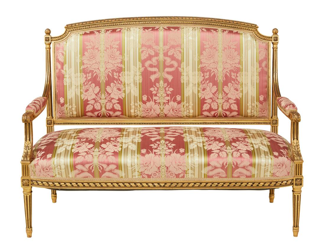 Louis XVI-Style Giltwood Settee: Louis XVI-Style Giltwood Settee 20th century, the slightly domed and padded back surmounted by a beaded and guilloche-carved crest and end finials, joined by padded, foliate-carved arms to the padded 