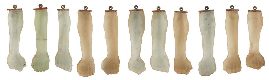 Mitchell Gaudet (American/Louisiana, b. 1962): Mitchell Gaudet (American/Louisiana, b. 1962) "11 Fists" blown and molded glass each with oxidized iron hook for display. h. 16" to 17", w. 5", d. 2"-2-1/2"