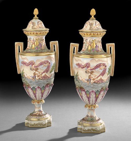 Pair of Capodimonte Brass-Mounted Garniture Vases: Pair of Capodimonte Gilt-Brass-Mounted Porcelain Covered Garniture Vases, in the neoclassical style, c. 1900, the covers each with gilt-brass finials of upright pineapple form, the bodies with elabora