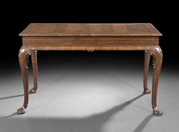 George III Anglo-Irish Mahogany Center Table: George III Anglo-Irish Mahogany Center Table, fourth quarter 18th century, the banded rectangular top with a string inlay of interlacing geometric patterns, above a plain frieze, raised on cabriole le