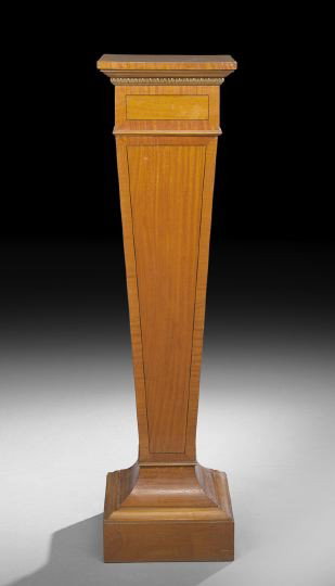 Edwardian Satinwood and Ribbon Mahogany Pedestal: Edwardian Satinwood and Ribbon Mahogany Pedestal, c. 1900, the square top with banded edge above a tapering pedestal terminating with a molded plinth base, h. 45-1/2", w. 12", d. 12".