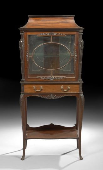 Edwardian Mahogany Vitrine on Stand: Edwardian Mahogany Vitrine on Stand, fourth quarter 19th century, the upper section having a pagoda-form top over a cabinet with glazed door and sides and a single long drawer below, the open base wit