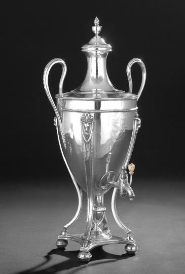George III Old Sheffield Plate Hot Water Urn: George III Old Sheffield Plate Hot Water Urn, fourth quarter 18th century, in the Adam taste, the ovoid body with steeply arched handles, tall waisted lid with flaming urn finial, and downturned spout