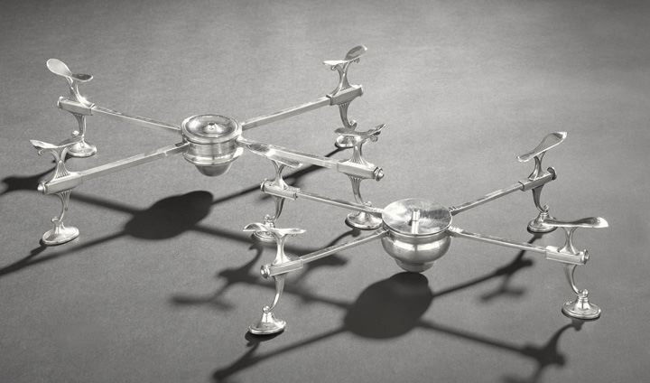 Two George III Silver Dish Crosses: Two George III Silver Dish Crosses, including a sterling silver example hallmarked Edinburgh, 1791-1792, by William Robertson II, l. 12-3/4", 18.06 t. oz., and an Old Sheffield Plate example of simila