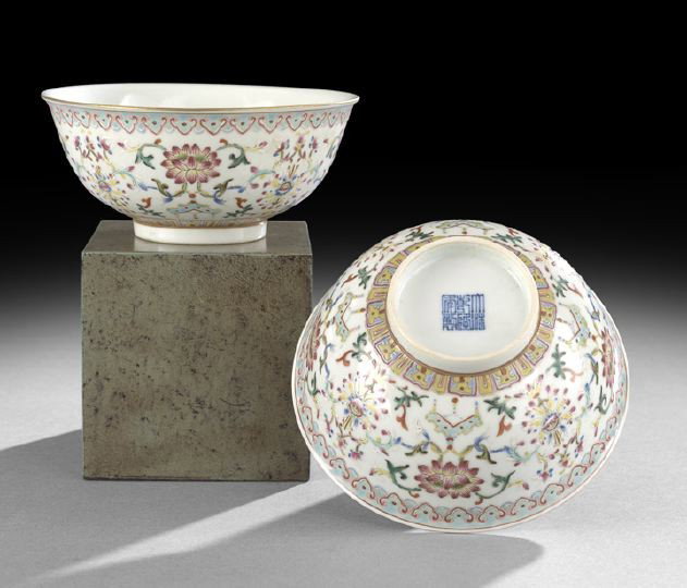 Good Pair of Chinese Famille Rose Porcelain Bowls: Good Pair of Chinese Famille Rose Porcelain Bowls, Republic Period (1908-1949), the interiors plain, the exteriors decorated with lotus flowers, scrolling foliage and Buddhist chimes with a border of 