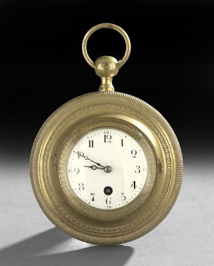 Wall Clock in the Form of a Pocket Watch: Empire Style Wall Clock in the Form of a Pocket Watch, first quarter 20th century, Swiss, the engine-turned brass case fitted with an enamel face clock under a beveled glass cover, the clock works sta