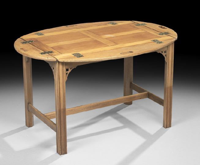 Edwardian-Style Mahogany Cocktail Table: Edwardian-Style Mahogany Cocktail Table, the banded rectangular top with hinged curved sides, raised on molded square legs joined by an H-form stretcher, h. 20", w. 35-1/2", d. 26".