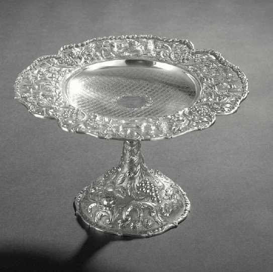 American Sterling Silver Baltimore-Style Compote: American Sterling Silver Baltimore-Style Compote, first quarter 20th century, by the Loring Andrews Co., Cincinnati, Ohio, the elaborate quarter-lobed rim decorated with architectural scenes separated