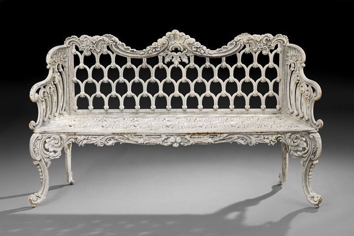 Large Anglo-American Cast-Iron Garden Bench: Large Anglo-American Cast-Iron Garden Bench, late 19th/early 20th century, in the "WHITE HOUSE ROSE GARDEN" pattern, attributed to Kramer Bros, Dayton, Ohio, the back adorned with floral clusters over