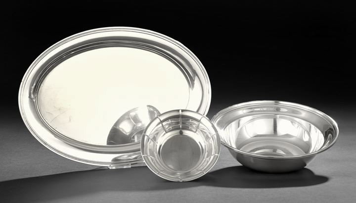 Three American Sterling Silver Dishes: Three American Sterling Silver Dishes, mid-20th century, including a Watson oval drinks tray with molded rim, l. 14", w. 10", a Gorham fruit bowl with molded rim, dia. 9", and a Priesner candy dish wi