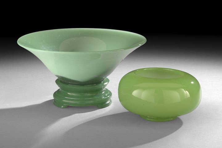 Two Pieces of Jade Green Molded Glass Bowls: Two Pieces of Jade Green Molded Glass Bowls, c. 1925, the first a jade green bowl in a classic Chinese shape, the unusual stand in the form typically made of ebonized wood, h. 5", dia. 10-1/4", togeth