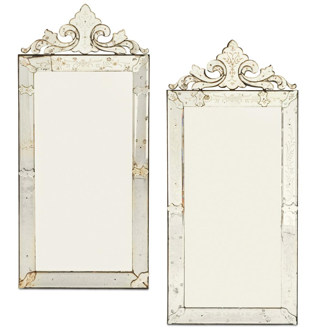Pair of Large Italian Venetian Pier Mirrors: Pair of Large Italian Venetian Pier Mirrors second quarter 20th century, the beveled mirrored crests with central scalloped panels flanked by scrollwork engraved with tendrils and leaves, the beveled 