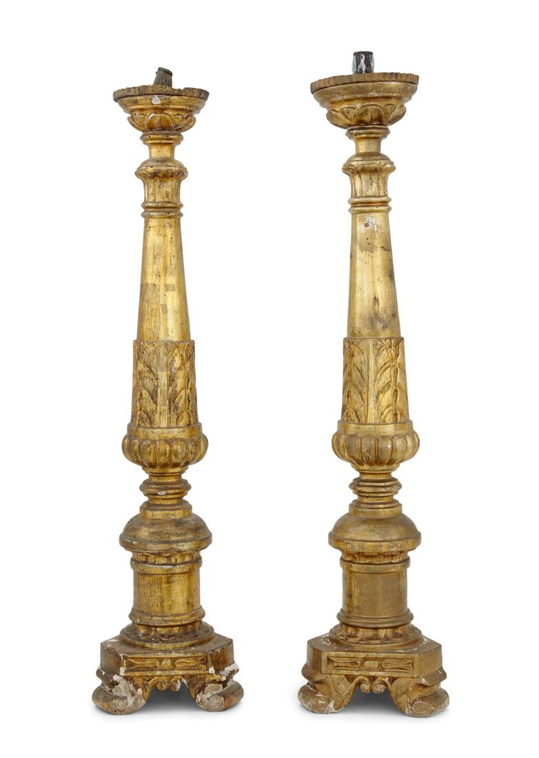Pair of French Restauration Altar Sticks: Pair of French Restauration Giltwood and Tole Altar Sticks second quarter 19th century, set with tole candle sockets and fluted drip pans, the tapered, column-form standards with leaf-carved capitals