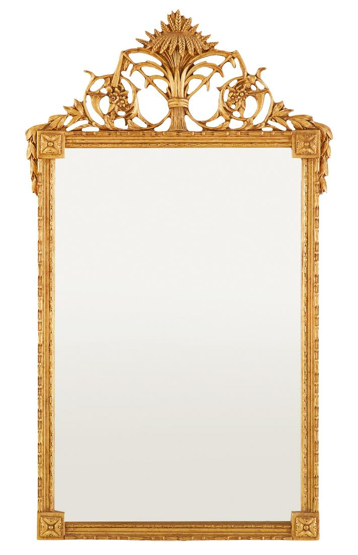 Giltwood Mirror in the George III Taste: Giltwood Mirror in the George III Taste 20th century, the pierced crest with a sheaf-of-wheat finial, flanked by pierced scrollwork, the surround with carved square corner medallions and carved runnin