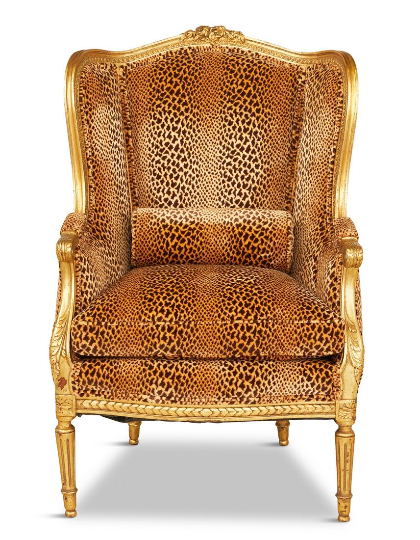 Louis XVI-Style Giltwood Bergere avec Oreilles: Louis XVI-Style Giltwood Bergere avec Oreilles 20th century, the padded and trisected back joined by downswept and padded arms to the cushioned seat, raised on tapered circular legs headed by floral c