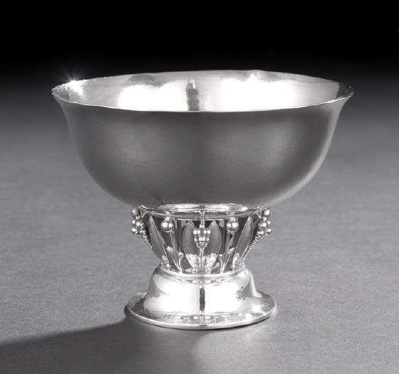 Georg Jensen (1866-1935) Sterling Silver Bowl: Georg Jensen (1866-1935) Sterling Silver Bowl, model 197B, designed in 1919 by Georg Jensen, with the 1925-1932 Jensen mark, Copenhagen, the bowl with an everted rim and raised on an open stem of styl