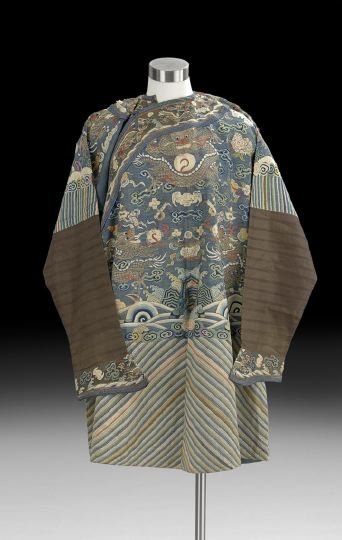 Unusual Child's Kessi and Embroidery Dragon Robe: Unusual Child's Kessi and Embroidery Dragon Robe, 19th century, the blue-ground kessi woven with five-clawed dragons among clouds, Buddhist symbols and bats above a striped lower border, the robe made