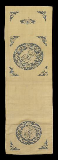 Chinese Silk Kessi Chair Cover: Chinese Silk Kessi Chair Cover, 19th century, of rectangular outline, the yellow ground woven with two roundels of peaches and cranes surrounded by bats, clouds and Buddhist symbols and corner bracket